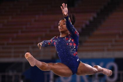"Simone Biles: Rising" will begin streaming July 17 on Netflix. The docuseries traces the return to competition by Biles, shown here at the U.S. championships, after a case of "the twisties" at the Tokyo Olympics.