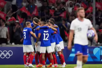 France beats US 3-0 and Morocco gets a win against Argentina in a wild start to Olympic soccer