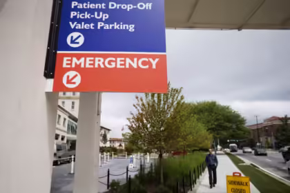 Signs point toward the emergency department at Emory University hospital in Atlanta, Georgia. Photograph: David Goldman/AP