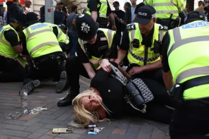 Protesters detained in Nottingham, central England, on August 3, 2024 during the ’Enough is Enough’ demonstration held in reaction to the fatal stabbings in Southport on July 29. (AFP)