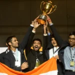 Members of India's Open team celebrate with the winner's trophy at the 45th FIDE Chess Olympiad in Budapest, Hungary, September 22, 2024 [Denes Erdos/AP]